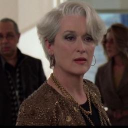 The World of Miranda Priestly - EMILY: Oh, my God. What took you so long? I  have to pee! ANDREA: What? You haven't peed since I left? EMILY: No, I  haven't. I've